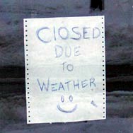 [Photo of handwritten sign reading 'Closed due to weather'.